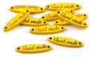 Metka drewniana "Hand made" 27x6 owal - żółta