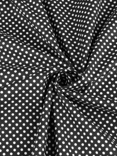 Handbag lining: 'Diagonal Herringbone' - white polka dots on pink background